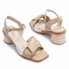 Sandalia de cuero beige con taco circular de yute