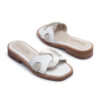 Zuecos bajos de cuero blanco y plata